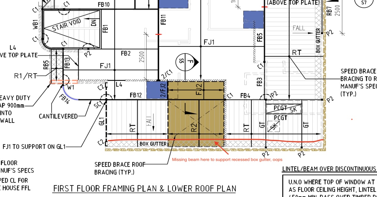 Engineer reviewing structural plans on a construction site