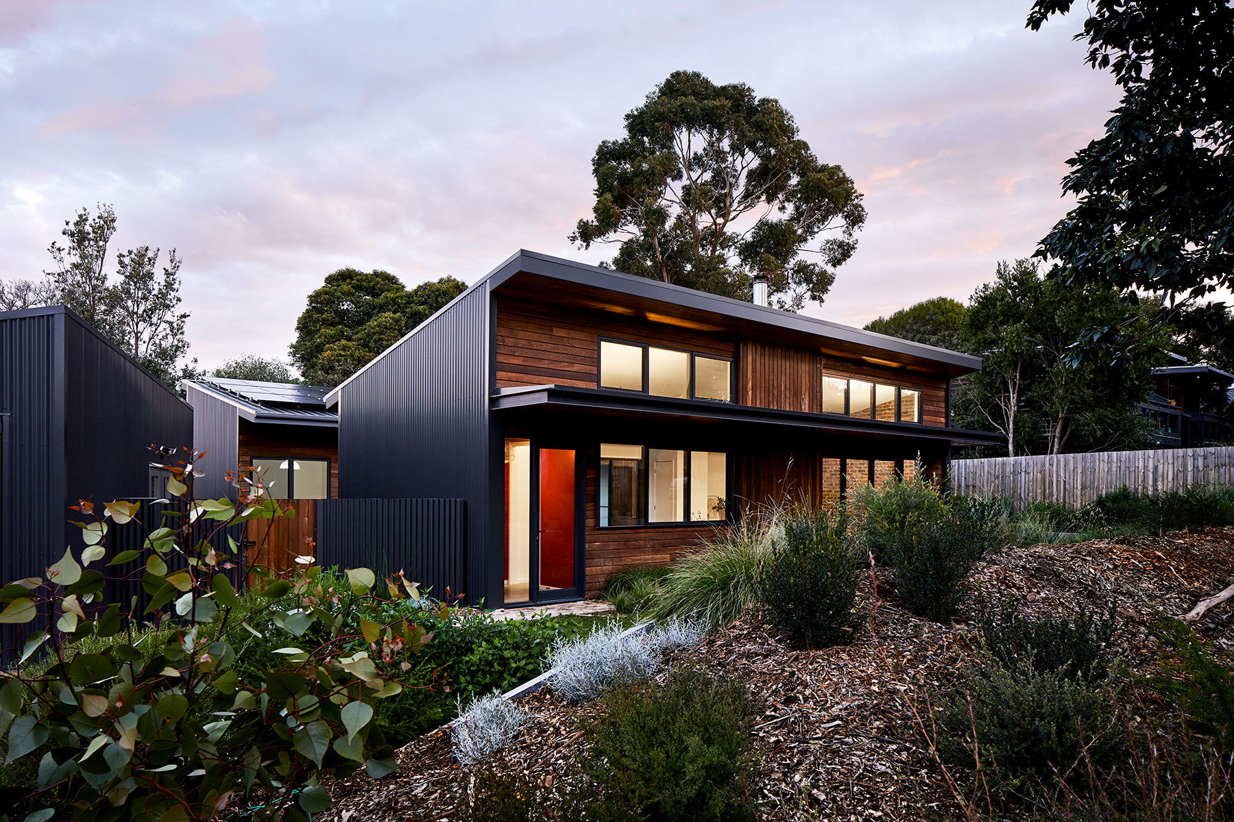 Sustainable villa with solar panels and green design